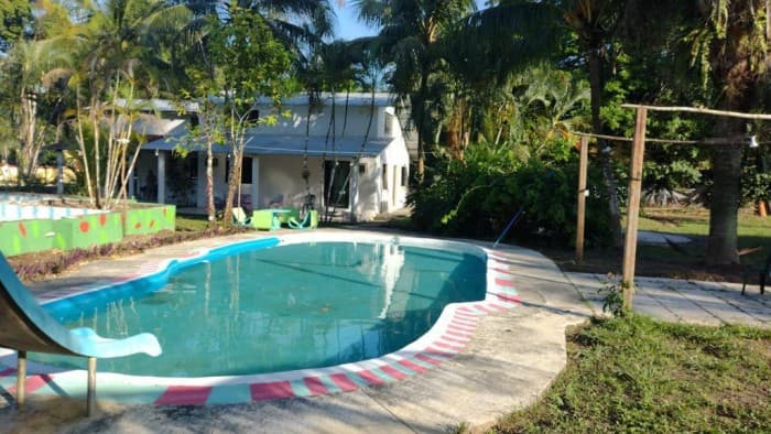 VENDO TERRENO CON CONSTRUCCIÓN Y PISCINA MANSIÓN DE RIO - 1