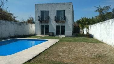 CityMax Antigua promueve casa en venta en condominio en Escuintla, ideal para fines de semana tiene piscina - 1